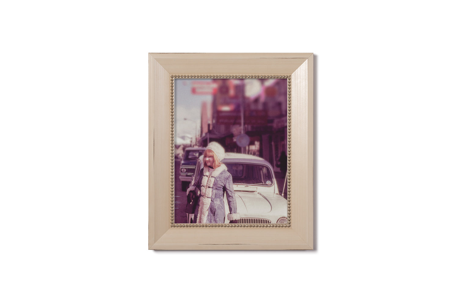 cream frame with gold beads